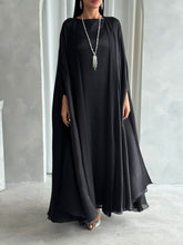Qamar in Black