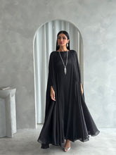 Qamar in Black