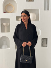 Manal in Black