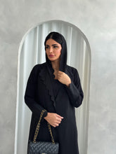 Amna in Black