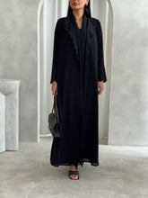 Amna in Black
