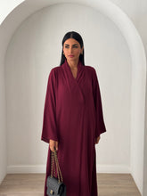 Manal in Maroon
