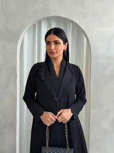 Amna in Black