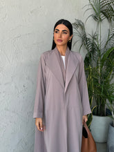 Asma in Brown