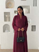 Manal in Maroon